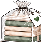 Folded laundry wrapped in a clear bag with a heart tag